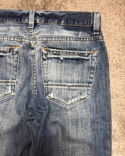 BOOTCUT “LIGHT RAYS“ DENIM