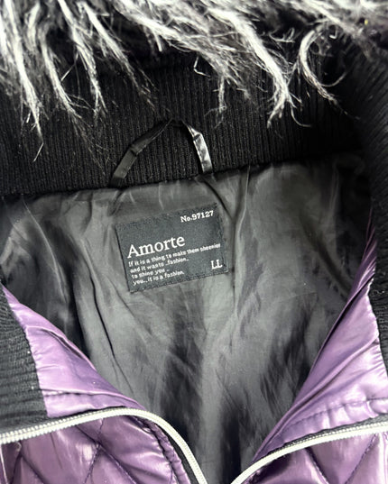 Amorte puffer jacket detail of ribbed cuff, zip or inner lining and quilted shell