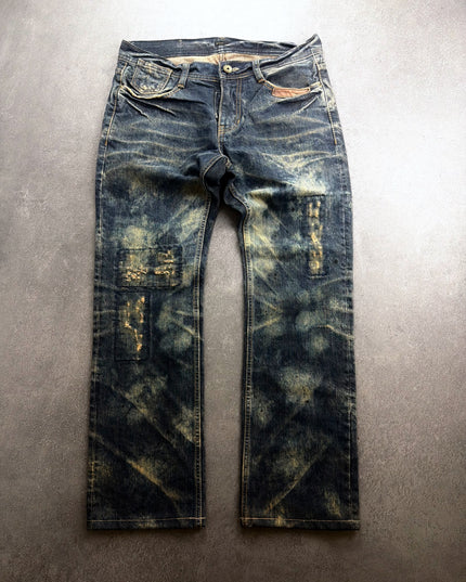 AVH Nicotine Halo denim front view with tan mud wash and leg patches