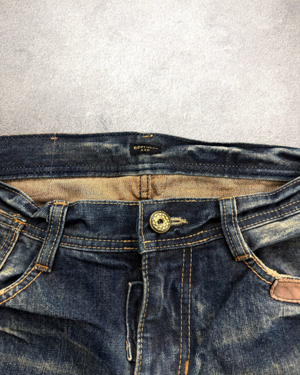 AVH denim detail of the faded lower leg and contrast stitched hem