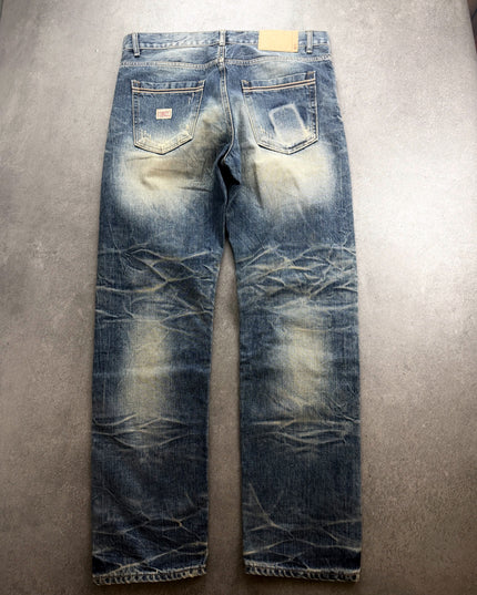 BILLVAN denim back view showing pockets, patch and heavy honeycomb creasing behind knees