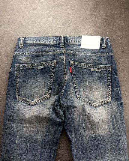DOWBL denim back close-up showing frayed pockets, white patch and faded seat
