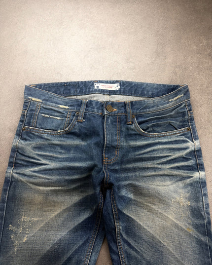 DPSR denim front waist close-up showing pockets, button and sand-toned fading