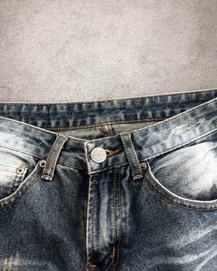 HEISEI faded denim detail of knee shredding and honeycomb creasing on the leg