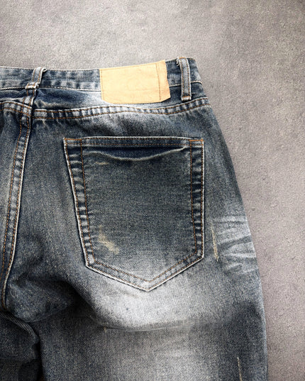 HEISEI straight denim hem and leg opening detail showing wash and worn edges