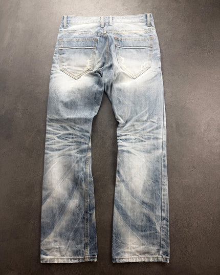 IMPROVES faded denim back view showing scratched pockets and whiskering behind knees