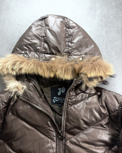 Joneaa puffer jacket collar close-up showing fur trim, inner label and zip