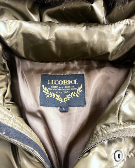 Licorice puffer jacket detail of snap placket, pocket or cuff hardware