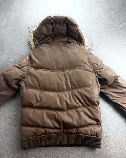 Louis Chavlon puffer jacket back view showing quilted channels and ribbed hem