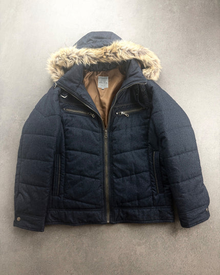 Louis Chavlon navy hooded puffer jacket with faux-fur trim, front view on grey floor