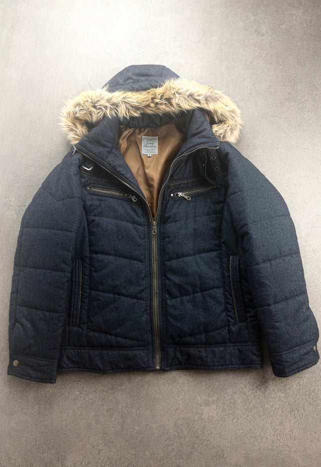 Louis Chavlon navy hooded puffer jacket with faux-fur trim, front view on grey floor
