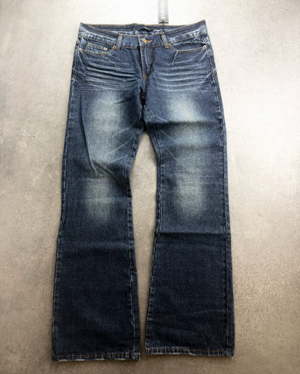 PANDORA faded indigo bootcut denim laid flat, front view with thigh fading and whiskering