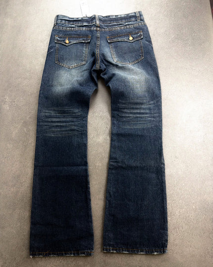 PANDORA denim back view showing flap pockets with gold buttons and faded flared legs