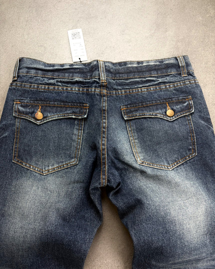 PANDORA denim back close-up of flap pockets, gold buttons and washed seat