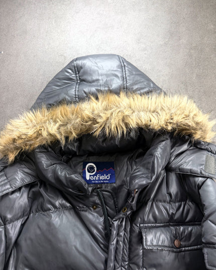 Penfield puffer jacket collar close-up with fur hood trim and blue woven Penfield label