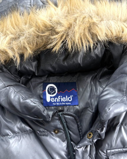 Penfield puffer jacket sleeve detail with round logo patch and elasticated cuff
