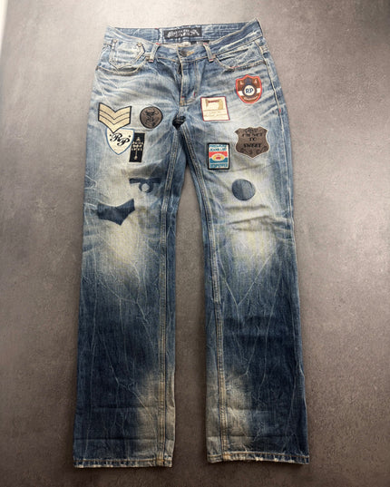 Red Pepper patchwork faded straight denim, front view laid flat with military badges