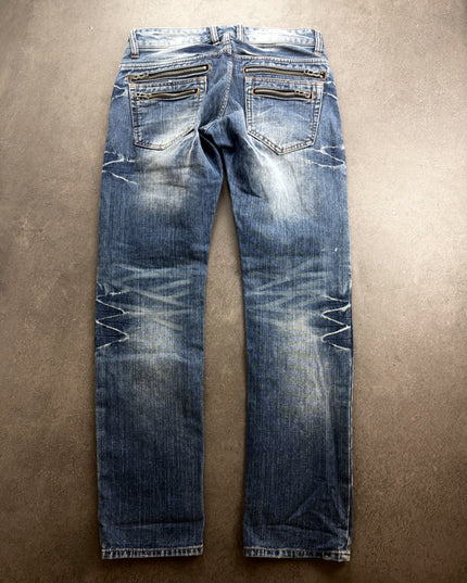 ROOT THREE denim jeans back view showing silver zip pockets and knee creases