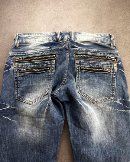 ROOT THREE denim back close-up showing double silver zippers on both back pockets
