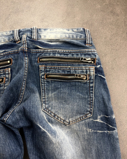 ROOT THREE denim hem and leg opening detail showing the wash and stitching