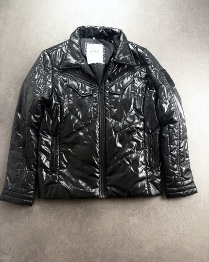 Russ K glossy black puffer jacket laid flat, front view with chest pockets