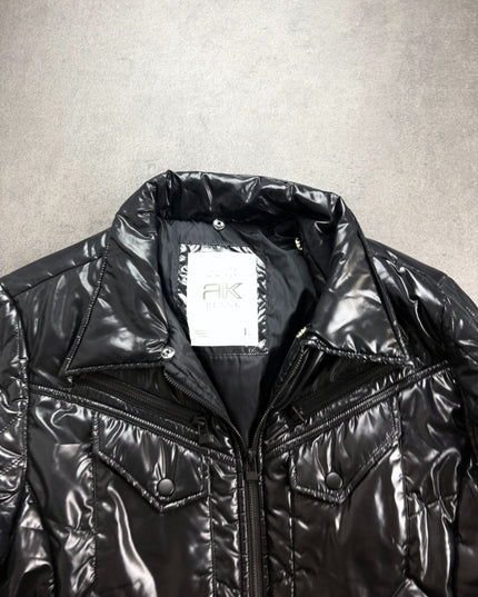Russ K puffer jacket collar close-up with RK Russ K label and snap buttons