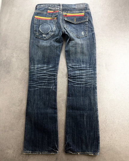RUSS K bootcut denim back view with yellow and red zip pockets and knee creases