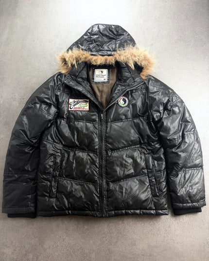 T&C Surf black hooded puffer jacket front view with fur trim and chest patches