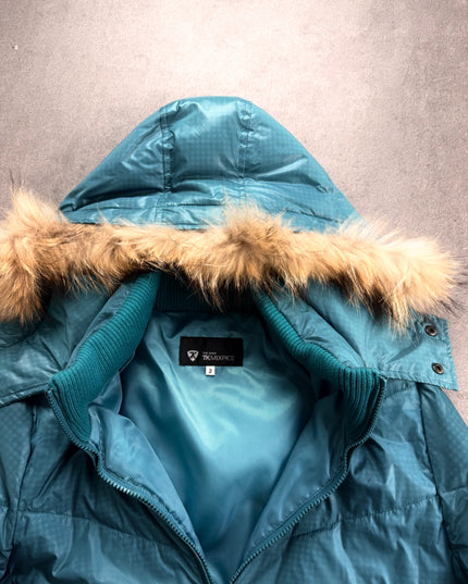 Close-up of Takeo Kikuchi puffer collar with ribbed knit, teal lining and TK MIXPICE label