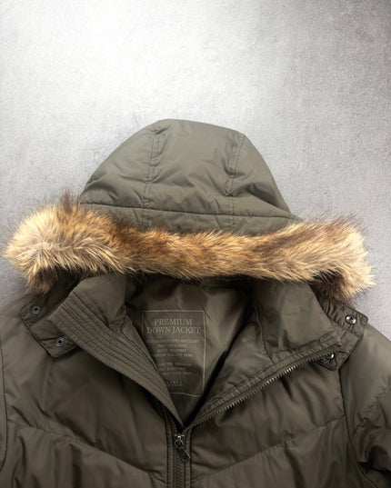 TAKEO KIKUCHI puffer jacket collar close-up with fur hood trim and Premium Down Jacket label