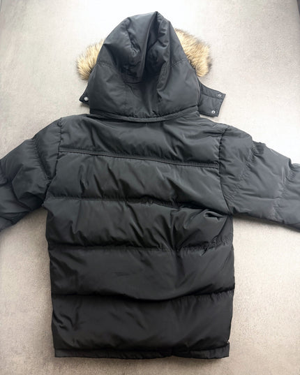 Back view of Takeo Kikuchi black puffer jacket with hood and quilted baffles