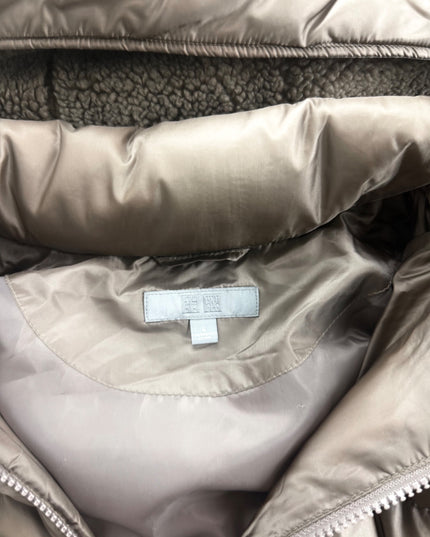 UNIQLO puffer jacket inside collar with brand label and fleece-lined hood